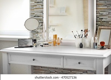 Cosmetic Set On Light Dressing Table