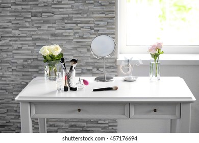 Cosmetic Set On White Dressing Table