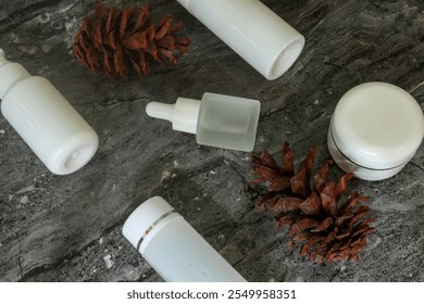 Cosmetic skin care products from the new women's facial care line for health, beauty and well-being. White imitation lotion bottles, cream jars, serums and soap dispensers - Powered by Shutterstock