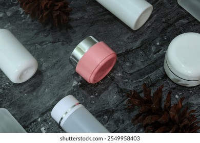 Cosmetic skin care products from the new women's facial care line for health, beauty and well-being. White imitation lotion bottles, cream jars, serums and soap dispensers - Powered by Shutterstock