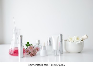 Cosmetic Skincare Beauty Product .natural Organic Flower Oil Ingredient In The Laboratory. Packaging Spa Concept.