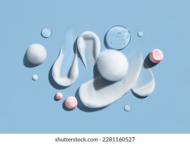 cosmetic smears cream texture on blue background - Shutterstock ID 2281160527