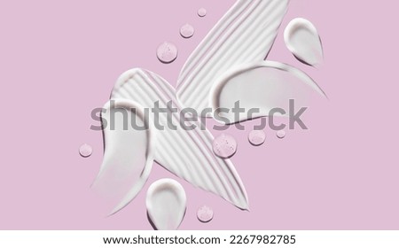 Image, Stock Photo Cosmetic smears of cream presented on a blue background