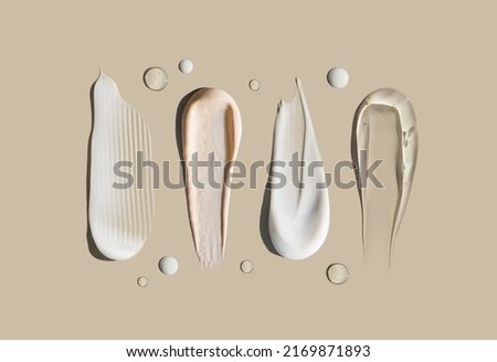 cosmetic smears of creamy texture on a pastel background Foto d'archivio © 