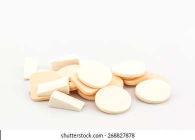 Cosmetic sponges on white background, powder puff, cosmetic puff. 