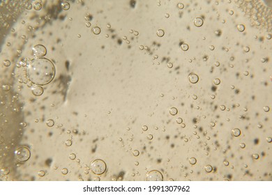 Cosmetic Texture With Bubbles On Beige Background. Cleanser, Shampoo, Wash - Liquid Soap, Shower Gel, Hyaluronic Acid, Serum. Cosmetics Banner.