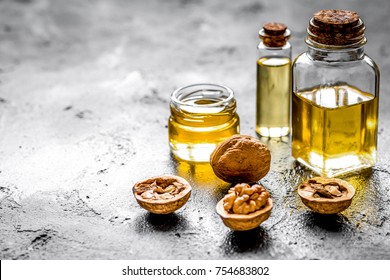 cosmetic and therapeutic walnut oil on dark background