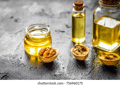 cosmetic and therapeutic walnut oil on dark background