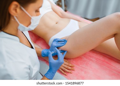 Cosmetician Gives Injection In The Thigh