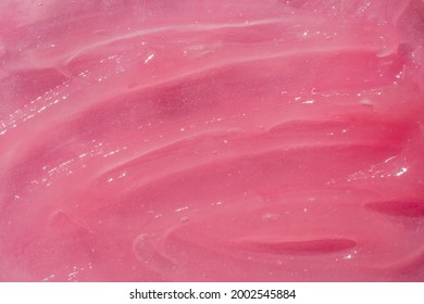 Cosmetics Cream, Balm Smear Smudge Swatch, Pink Rosa Textured Background. Cosmetic Product Texture. Moisturizer Drop, Mask, Shea Butter Backdrop, Ointment Blob. Macro, Closeup