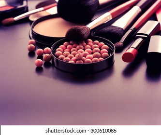 Cosmetics Make-up On Black Background. Top View Mock Up.