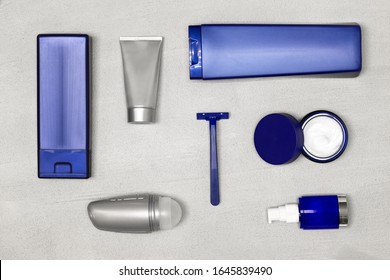 Cosmetics For Men Flatlay. Male Grooming Cosmetic Products On Concrete Background. Top View, Flat Lay