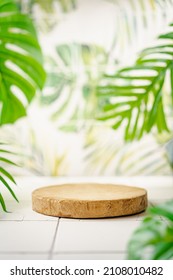 Cosmetics product advertising stand. Exhibition wooden podium on green background with palm leaves and shadows. Empty pedestal to display product packaging. Mockup - Shutterstock ID 2108010482
