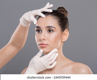 Cosmetologist Checking Young Woman Face Before Beauty Treatment, Free Space