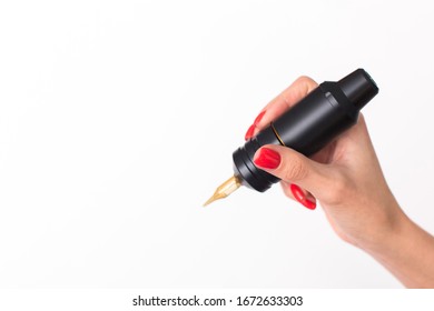 Cosmetologist Holds In Hand Permanent Eyebrow Tattoo Machine Isolated On White Background With No People