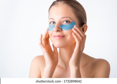 Cosmetology, Skin Care, Face Treatment, Spa And Self-care At Home Concept. Woman With Eye Gel Pads Mask. Copy Space