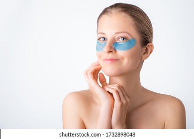 Cosmetology, Skin Care, Face Treatment, Spa And Self-care At Home Concept. Woman With Eye Gel Pads Mask. Copy Space