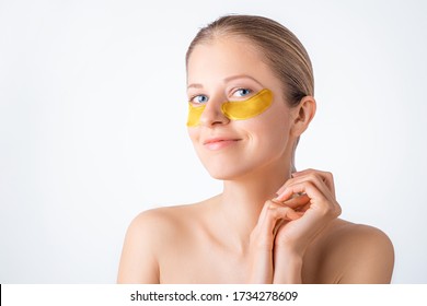 Cosmetology, Skin Care, Face Treatment, Spa And Self-care At Home Concept. Woman With Eye Gel Pads Mask. Copy Space