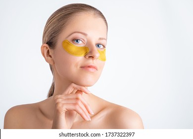 Cosmetology, Skin Care, Face Treatment, Spa And Self-care At Home Concept. Woman With Eye Gel Pads Mask. Copy Space