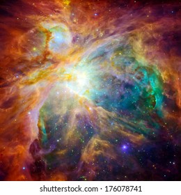 The Cosmic Cloud Orion Nebula - 1,500 Light-years Away From Earth. Retouched And Cleaned Version Of Original Image With Infrared And Visible-light From Hubble Space Telescopes: NASA/JPL-Caltech/STScI