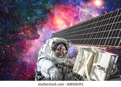 Cosmonaut Works Outside The International Space Station. Elements Of This Image Furnished By NASA.