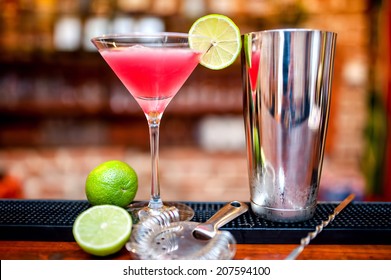 Cosmopolitan Cocktail Drink At Casino And Bar Served With Lime And Ice