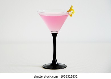 cosmopolitan cocktail with lemon peel