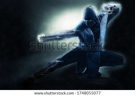 Cosplay Blue ninja warrior on ice on a black background
