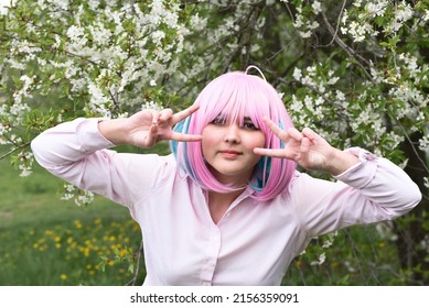 Cosplay,portrait of anime girl with pink color hair.