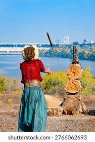The Cossack throws his axe