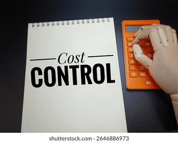 Cost Control Concept on Notebook with Wooden Hand Pressing Calculator, Symbolizing Financial Planning, Expense Management, Budget Control, Business Strategy, and Profit Optimization. 