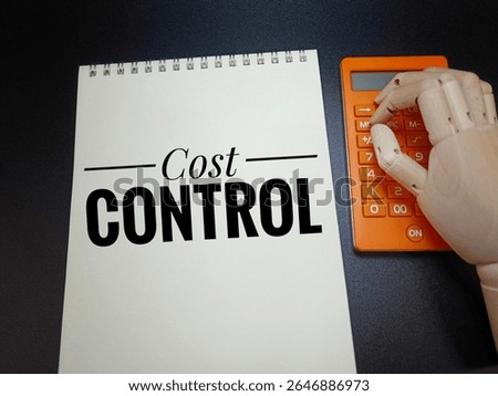 Cost Control Concept on Notebook with Wooden Hand Pressing Calculator, Symbolizing Financial Planning, Expense Management, Budget Control, Business Strategy, and Profit Optimization. 