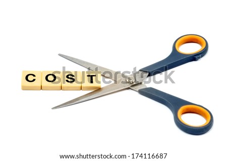 Cost cutting Turkish tasarruf being cut by a scissors isolated on white background