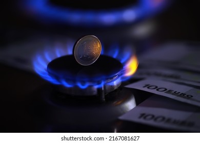 The cost of gas, the euro crisis. 100 euros on a gas burner. Sanctions Russian gas - Shutterstock ID 2167081627