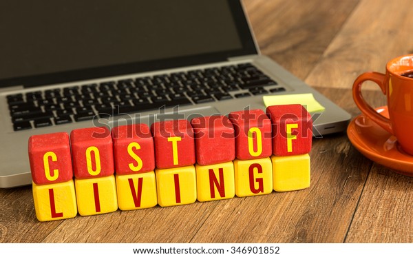 Cost Living Written On Wooden Cube Royalty Free Stock Image