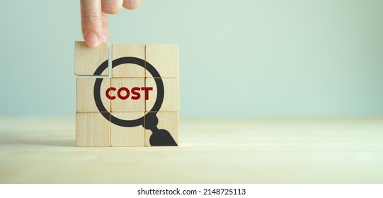Cost management concept. Lean, control, reduction, optimization costs. Efficiency project management for cost leadership in market. Placing wooden cubes with cost, magnifier glass on smart background.