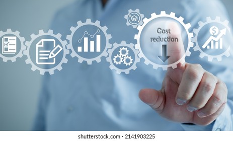 Cost Reduction Concept. Businessman With His Hand Lowers The Arrow Of The Graph. Cost Text With A Down Arrow.budget,Cost Management 