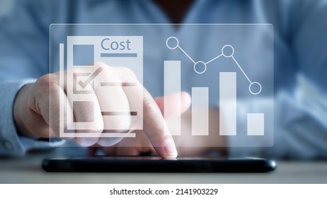 Cost reduction Concept. Businessman with his hand lowers the arrow of the graph. Cost text with a down arrow.budget,Cost Management. cut. 