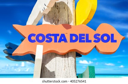 Costa Del Sol Signpost With Beach Background