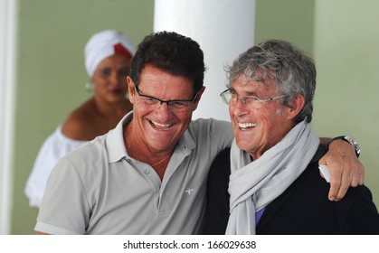 COSTA DO SAUIPE, BRAZIL: DEC 05: Russia's Coach Fabio Capelo (L) Talks With Coach Bora Milutinovic On December 5,2013 In Costa Do Sauipe, Bahia  