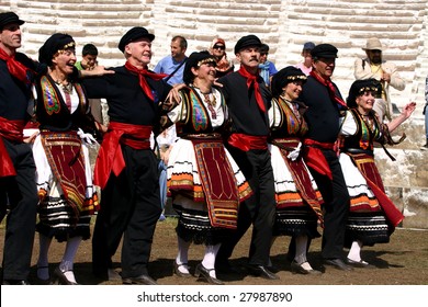 COSTA MESA, CA - APRIL 4 : Greek Syrtaki Folk Dance Ensemble of Orange County perform at the Anatolian Cultures and Food Festival at the Orange Country Fair Grounds April 4, 2009 in Costa Mesa, CA.
