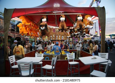 Costa Mesa, California, USA - July 20, 2022: Orange County Fair In Costa Mesa, California. People Play Games Of Skill For Prizes While At The OC Fair. 