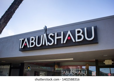 Costa Mesa, California/United States- 04/22/2019: A store front sign for the Japanese restaurant known as Tabu Shabu