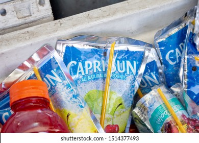 Costa Mesa, California/United States - 08/25/2019: Several Pouches Of Capri Sun Fruit Drinks In An Ice Cooler.