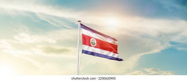Costa Rica national flag waving in beautiful sky. - Shutterstock ID 2230620905