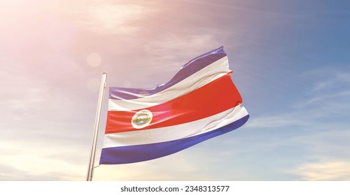 Costa Rica national flag waving in beautiful sky. - Shutterstock ID 2348313577