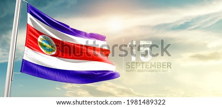 Costa Rica national flag waving in beautiful sunlight.
