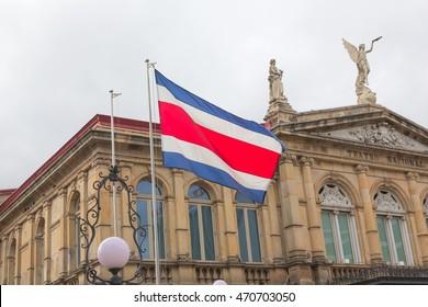 Costa Rican flag and National Theater (focus on flag)