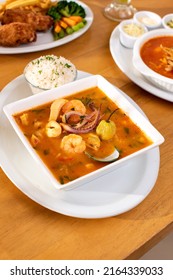 Costa Rican Sea Food Soup With Rice And Other Dishes Side