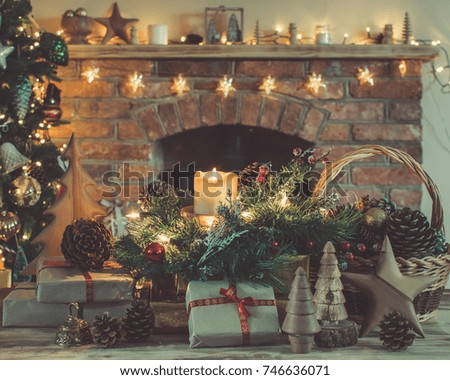 cosy christmas composition presents and decorations on the table in front of the fireplace with - Light Up Presents Christmas Decorations cosy christmas composition presents and decorations on the table in front of the fireplace with - Light Up Presents Christmas Decorations